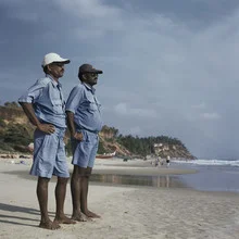 Photo of lifeguards on the beach in Varkala, Kerala, India.