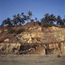 Photo art by Bernhard Lang: beach with palms, gentle waves, and rocks in Kerala