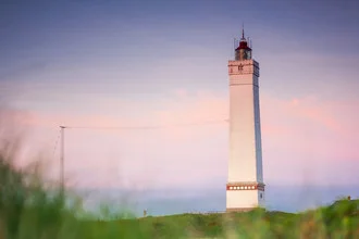Photo art by Torsten Muehlbacher: lighthouse at sunset in Denmark