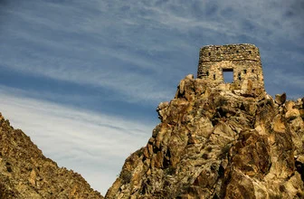 Beautiful photo art by Andreea Tanase: granite tower in the Armenian landscape.