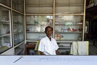 Photo art by Markus Hertrich: people in a pharmacy in Bangladesh