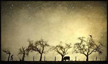 Photo art by Frank Wöllnitz: surreal cowboy with cigarette in evening light