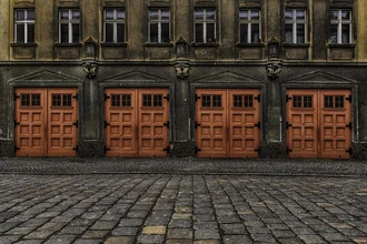 Photo art by Felizitas Maaz: old fire station in an urban setting with clear lines.