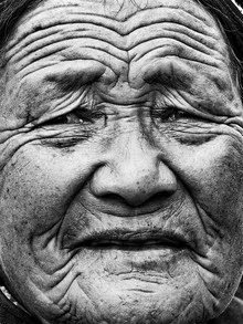 Portrait of an older man exuding wisdom and life experience.