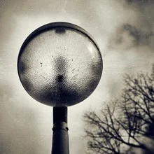 Photo art: a lantern with gentle textures in a calm setting