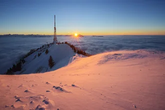 Photo art by Immanuel Rapp: sunset over the Alps with golden light.