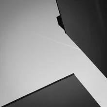 Black-and-white photo art depicting clean lines of a modern building in Germany.