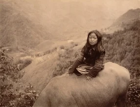Photo art by Andreas Kersten: child riding a unicorn in Vietnam