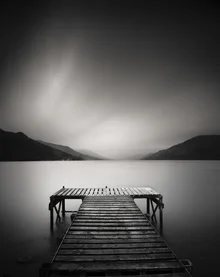 Photo art by Ronnie Baxter: black and white image of a jetty at dusk