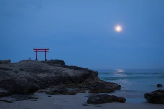 Photo art by Manuel Kürschner: Torii under the full moon at the beach with gentle waves