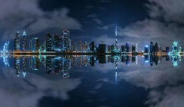 Panoramic photo of Dubai: skyscrapers and lights at night