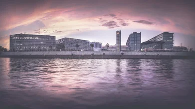 Photo art by Ronny Behnert: Berlin Main Station bathed in the warm light of sunset.