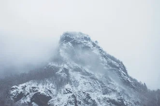 Photo art by Dia Takacsova: snowy mountain peak surrounded by soft blue mist