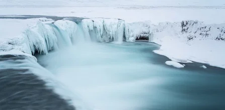 Photo art by Markus Van Hauten: serene waterfall in a wintry landscape