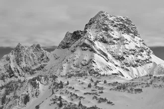 Photo art by Martin Kensy: large rock formation in snowy Alpine landscapes