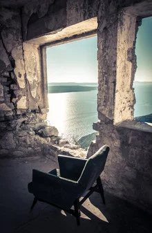 Photo art by Gabriele Spörl: view through a window at a ruin by the sea