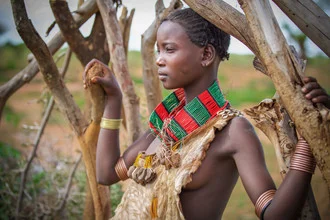 Photo art by Miro May: Hamer woman in nature wearing traditional jewelry
