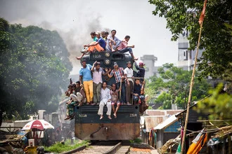 Photo art by Miro May: Train in a kitchen in the slum of Dhaka, Bangladesh.