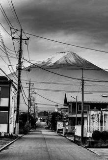 Photo art by Michael Wagener: Mount Fuji with soft clouds and calm water in the foreground.