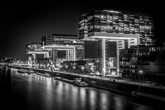Photo art by Markus Van Hauten: Crane houses on the Rhine at night, atmospheric city view