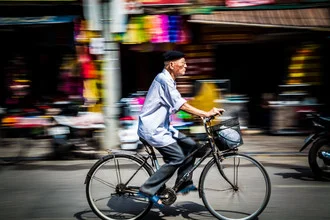 Photo art by Jörg Faißt: bustling street with bicycles in Ha Noi