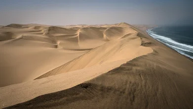 Photo art by Dennis Wehrmann: expanse of Namib desert sand with soft waves