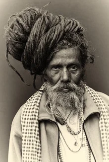Photo of a holy man in Nepal meditating, radiating calmness.