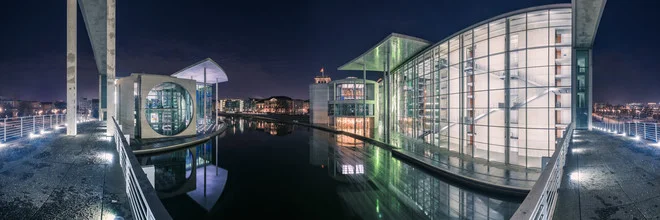Photo art featuring reflective buildings in Berlin's government district at night