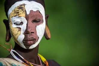 Photo art by Miro May: Suri woman with traditional body painting in nature