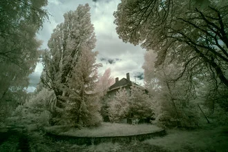 Photo of an abandoned Soviet barrack in Germany, captured in soft infrared tones.