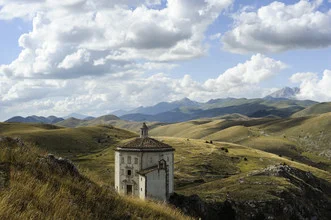 Photo art: serene landscape with a church and clouds in Abruzzo, Italy