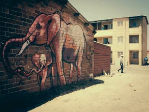 Photo art by Dennis Wehrmann: vibrant street view of a township in Cape Town