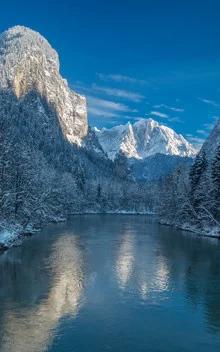 Fotokunst von Günther Reissner: Winterlandschaft mit reflektierenden Wasserflächen