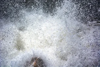 Dynamic photo art: breaking wave with powerful foam and movement