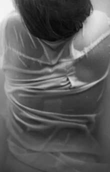 Photo art by Madelaine Grambow: a female figure in a bathtub with a gentle mood