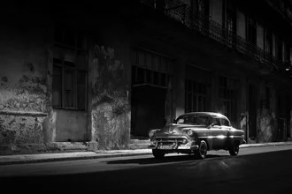 Photo art by Tillmann Konrad: a classic Bentley on a night street in Havana.