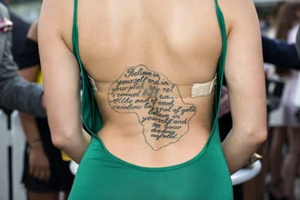 Photo art by Martin Von Den Driesch: elegant woman in a backless dress in Dubai.