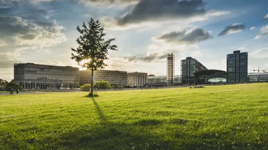 Photo art: Sunset at Berlin Central Station with warm colors and soft shadows.