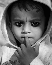 Photo art by Jagdev Singh: portrait of an amazed boy in New Delhi
