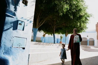 Photo art by Jim Delcid: calm street scene in Larache, Morocco.