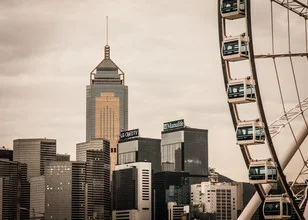 Photo art by Sebastian Rost: Hong Kong Ferris wheel against a beautiful skyline