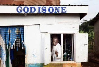 Photo art by Victoria Knobloch: portrait of a barber in Uganda reflecting on his faith.