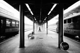 Photo art by Olah Laszlo-tibor: symmetrical bench at a train station