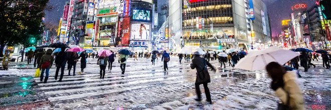 Photo art by Jörg Faißt: People with umbrellas at Shibuya Crossing in winter