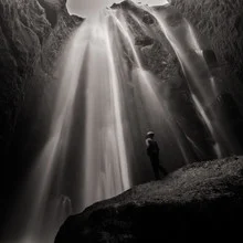 Photo art by Dennis Wehrmann: winter landscape with waterfall in black and white
