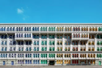 Colorful building with windows under blue sky, view of the old police station.