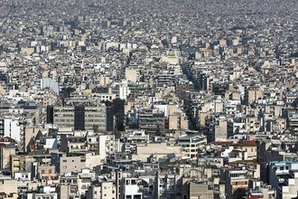 Aerial view of Athens: a sea of buildings and cityscape in calm colors
