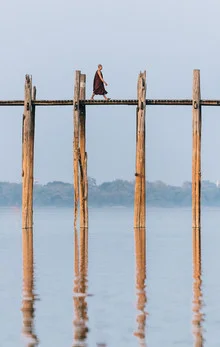 Photo art by Anne Beringmeier: monk on the bridge with reflection in the water