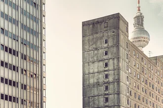 Photo art by Michael Belhadi: panel building in Berlin with TV tower in the background.