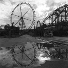Photo art by Andreas Kersten: Ferris wheel with reflection after rain in Yunnan, China